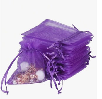 A stack of purple net drawstring bags