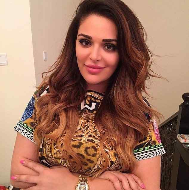 Mona Kattan wearing multi pattern top