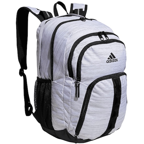 A Two Tone Black/White Adidas Prime VI Backpack with black zippers, black and white shoulder straps, and mesh pockets
