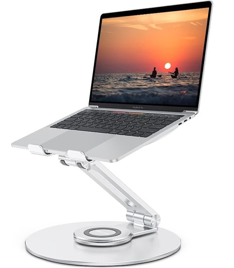 A MacBook Pro placed on a silver Omoton adjustable laptop stand with 360 rotating base