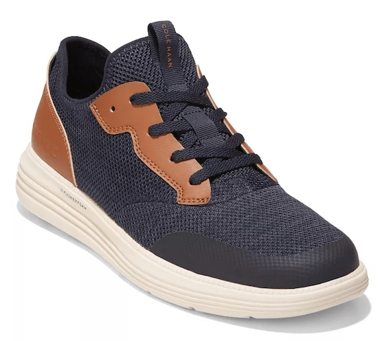 A navy blaze, white, and brown Cole Hanna Grand+ Journey Earthlite Sneaker 