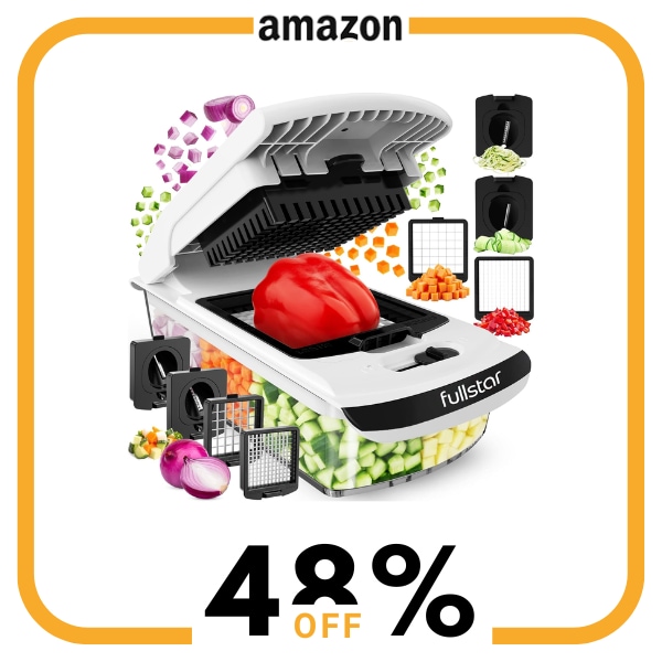 A black and white vegetable chopper with vegetables and accessories