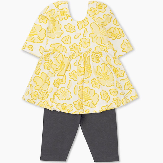 A yellow and white Daffodil Delight Let’s Dance Dress with Grey Leggings