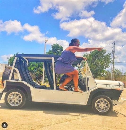 Caribbean Traveler and influencer Riselle in a jeep