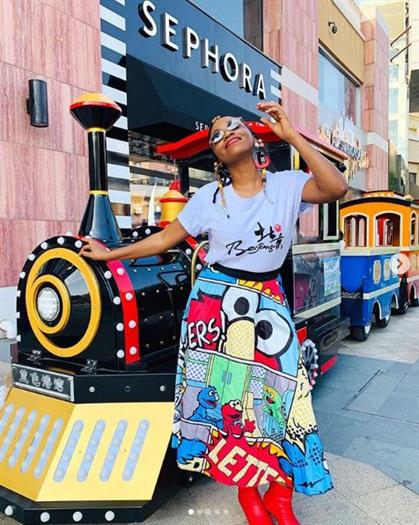 Botswana influencer Tsholo Dikobe in a Elmo print skirt