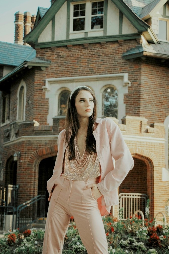 woman wearing pink suit