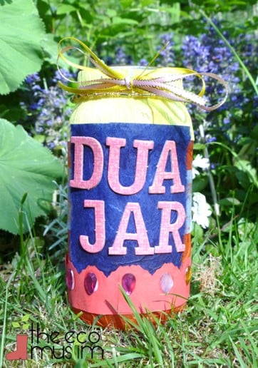 a colorful jar that says “DUA JAR”