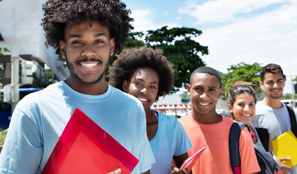 5 students posing for camera