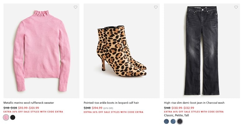 A pink sweater, leopard ankle boots, and black jeans on sale on J.Crew’s website