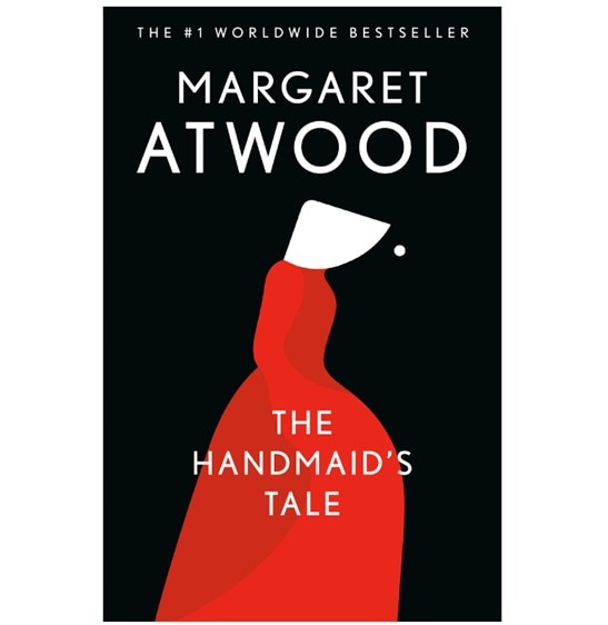 The black book cover of Margaret Atwood’s “The Handmaid’s Tale” with a red and white vector of the handmaid’s uniform
