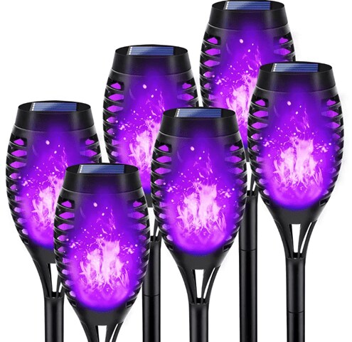 6 purple glass-like Halloween-themed torches