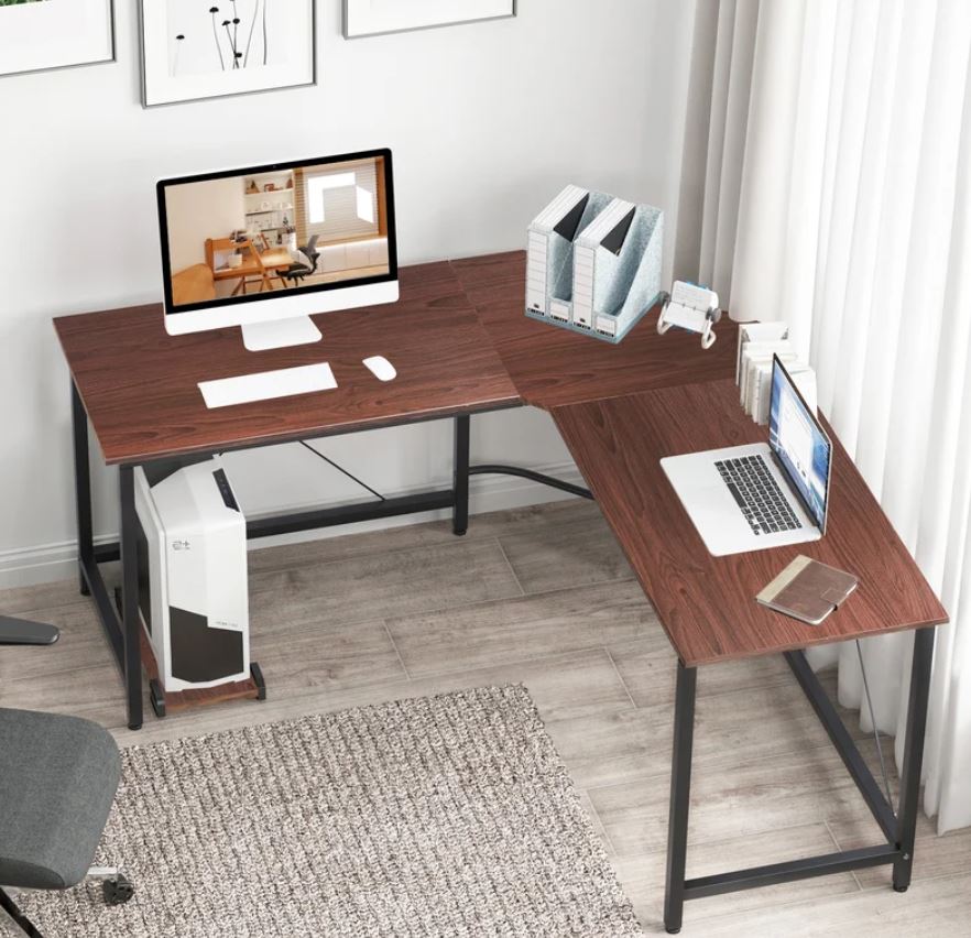 brown l-shaped office desk with laptop and desktop computer