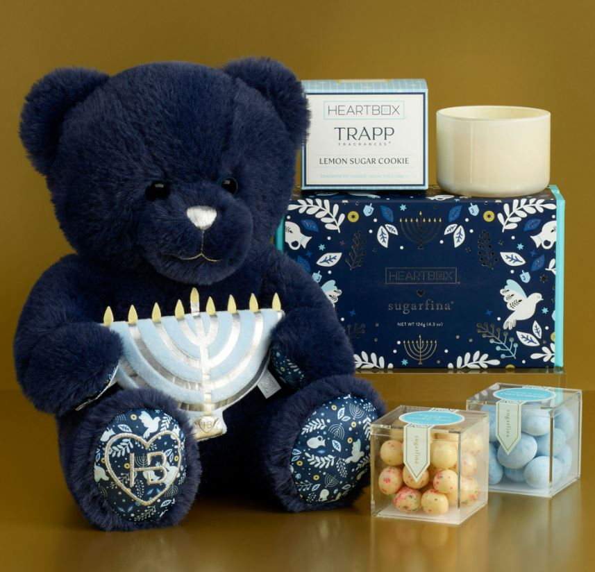 build a near hanukkah gift set with a cookies, a bear, candies, and a candle