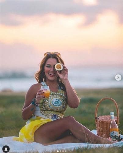 Puerto Rican influencer Nathasha Bonet enjoying a picnic in the Morro