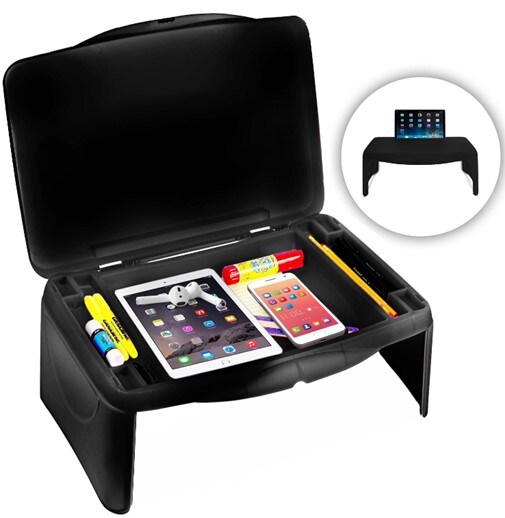 A black foldable lap desk with storage and with a tablet, a phone, earphones, markers, and pencils inside