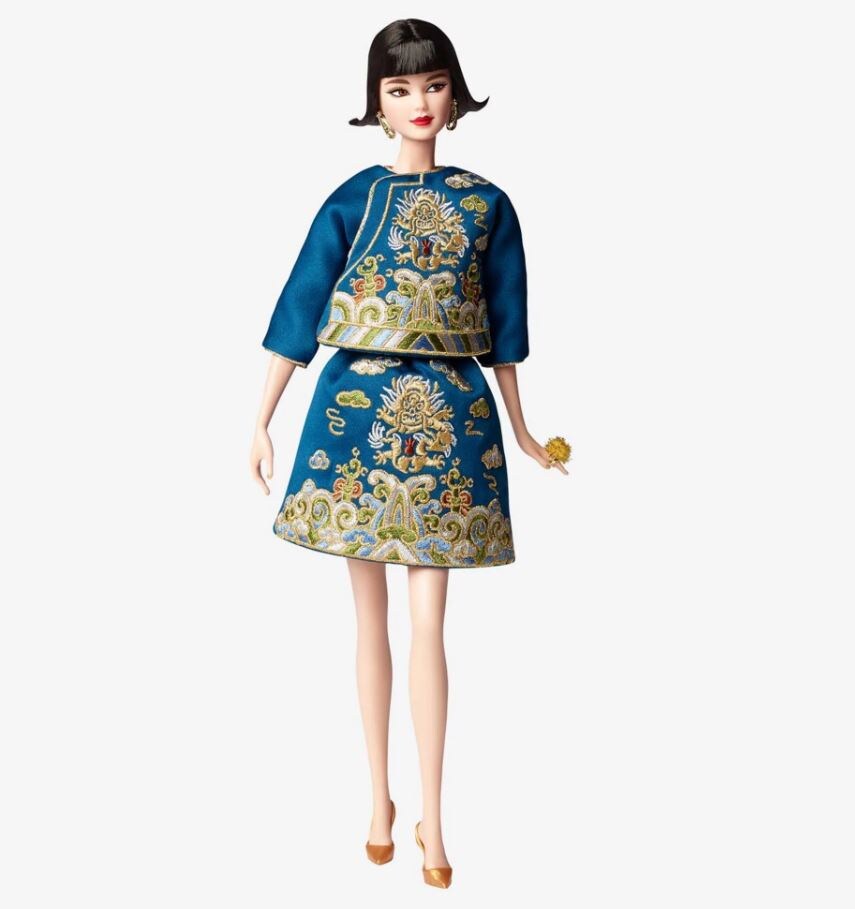 Barbie doll with a bob haircut and blue Guo Pei two-piece couture outfit