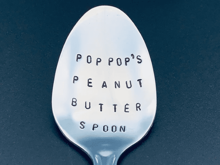 Personalized metal engraved spoon, it says: “Pop Pop’s peanut butter spoon