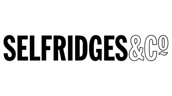 The Selfridges & Co. logo with the word Selfridges written in capital and bold black letters, and the & sign and Co. written in white letters with black outline on a white background