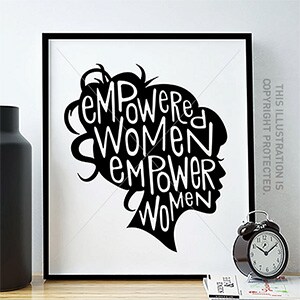 Black and white framed print with letters in silhouette of woman's head