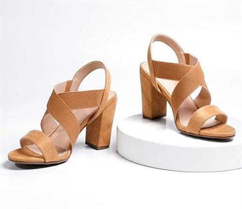 Brown high heel sandals with a chunky heel and elastic strap