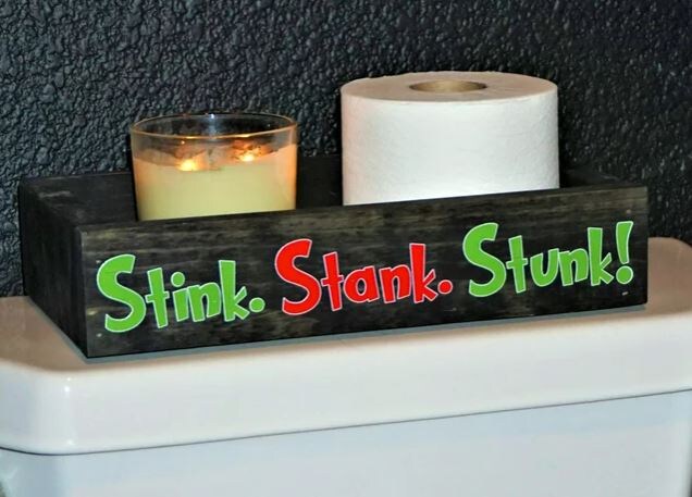 stink.stank.stunk. holiday decorated bathroom box with candles based on the Dr. Seuss classic the grinch 