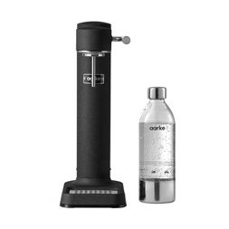 black sparkling water maker and clear bottle with soda