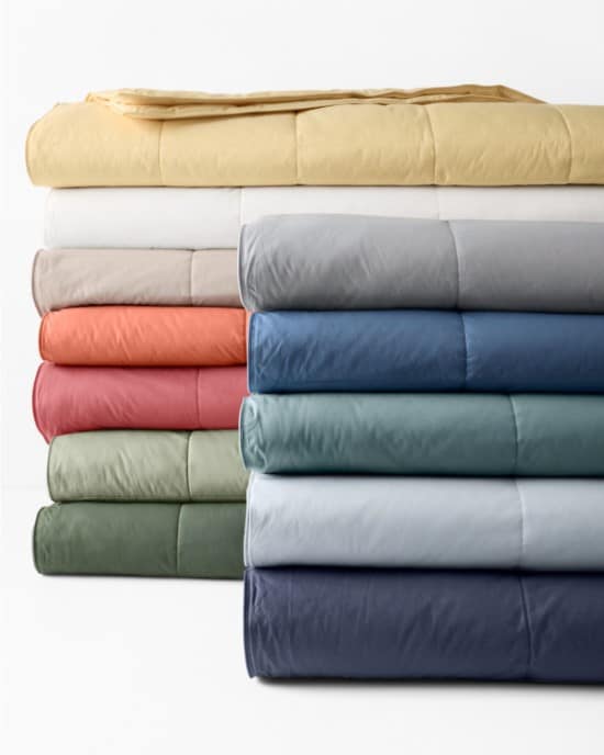 Garnet Hill essential down blanket in different color options, blue, green, red, orange, grey, white cream tones