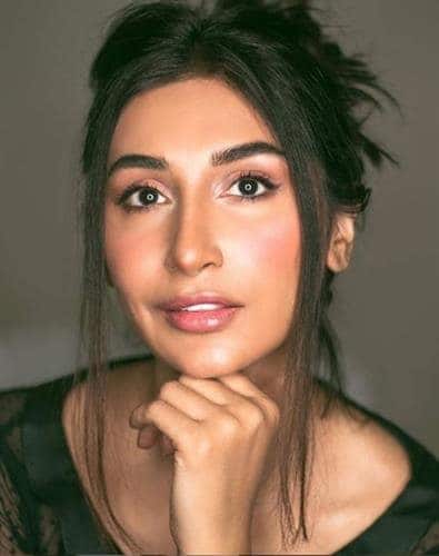 Up close and personal portrait of Pakistani beauty and fashion blogger Hira Tareen with her hair pulled back