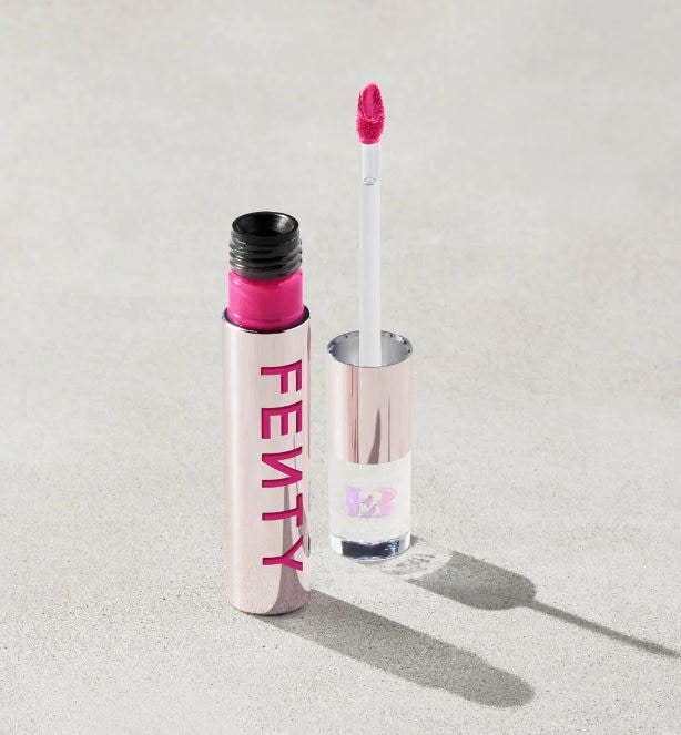 Small bottle of bright pink Fenty Beauty lipstick