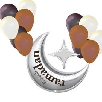 A set of black, white and brown balloons with a silver moon-and-star-shaped balloon in the middle that reads “Mubarak Ramadan”