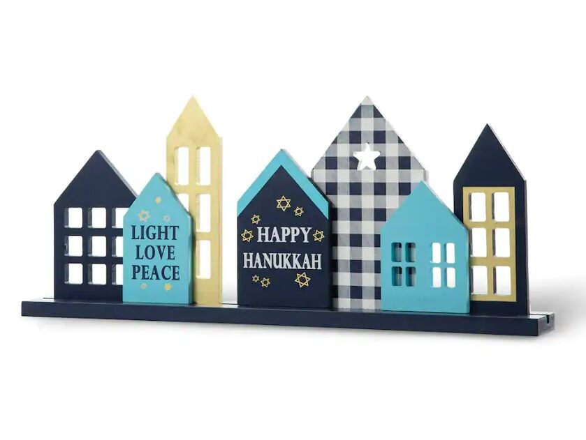 wooden table decor that reads light, love, peace and happy hanukkah