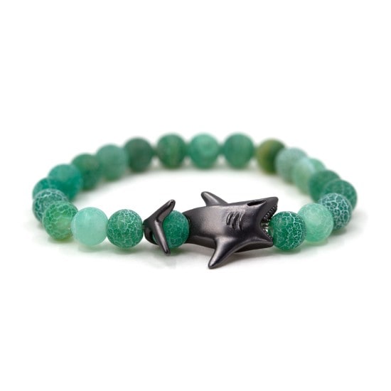 A turquoise glass bead shark tracking bracelet with pewter shark-shaped bead