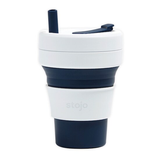 A white Stojo Biggie Travel Mug with indigo stripes on the bottom, middle, straw, and tab