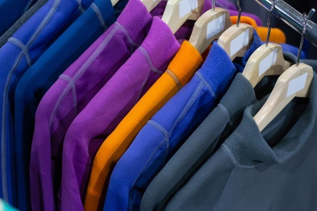 Colorful thermal clothes on a rack