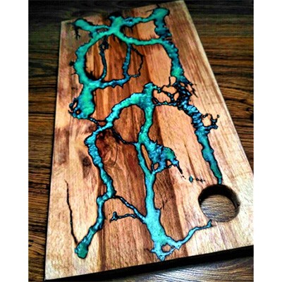 Chestnut Cutting Board Filled in with Turquoise and Black Epoxy Resin