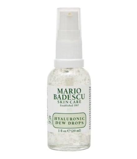 A simple 1 oz. bottle of the Mario Badescu Hyaluronic Dew Drops serum with white and light green design