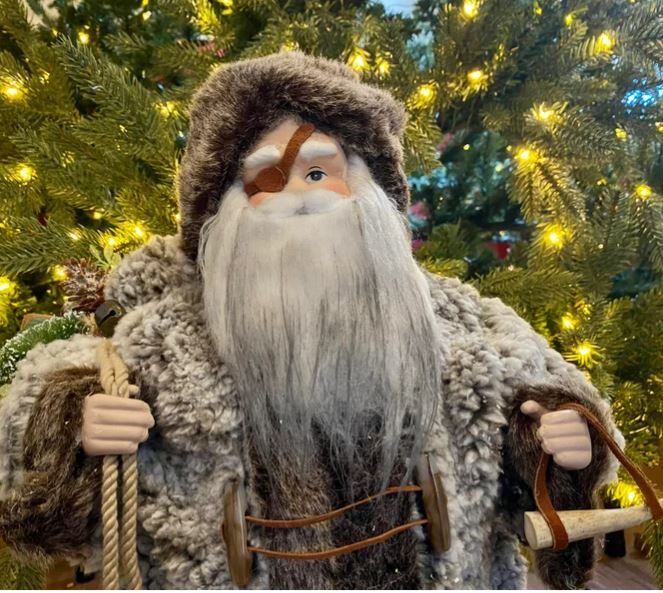 refurbished santa clause statue turned into odin the norse god