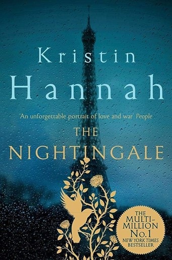 The blue and gold cover of Kristin Hannah’s “The Nightingale”