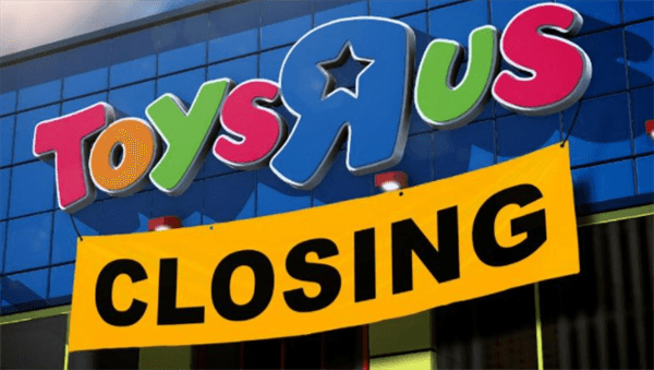 Toys R Us closing sign in front of building