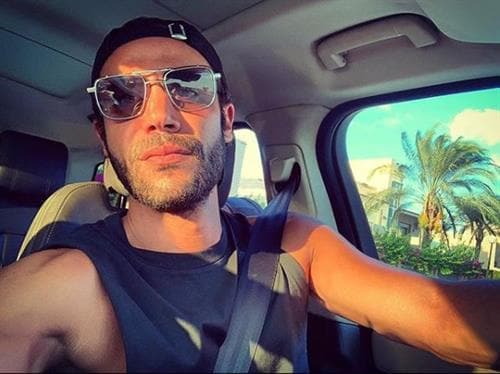 Egyptian model and actor Mohamed Emam in a car