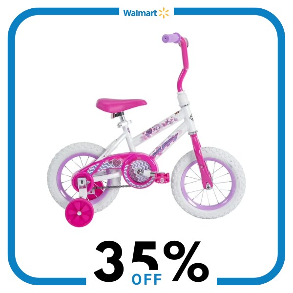 A pink and white bike for kids