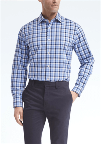 Blue plaid dress shirt and black pants on man