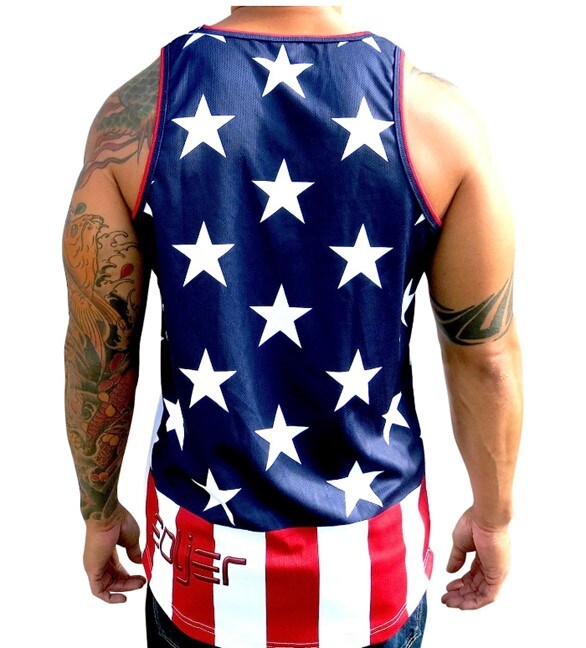 Tattooed man wearing an American flag-styled sleeveless jersey