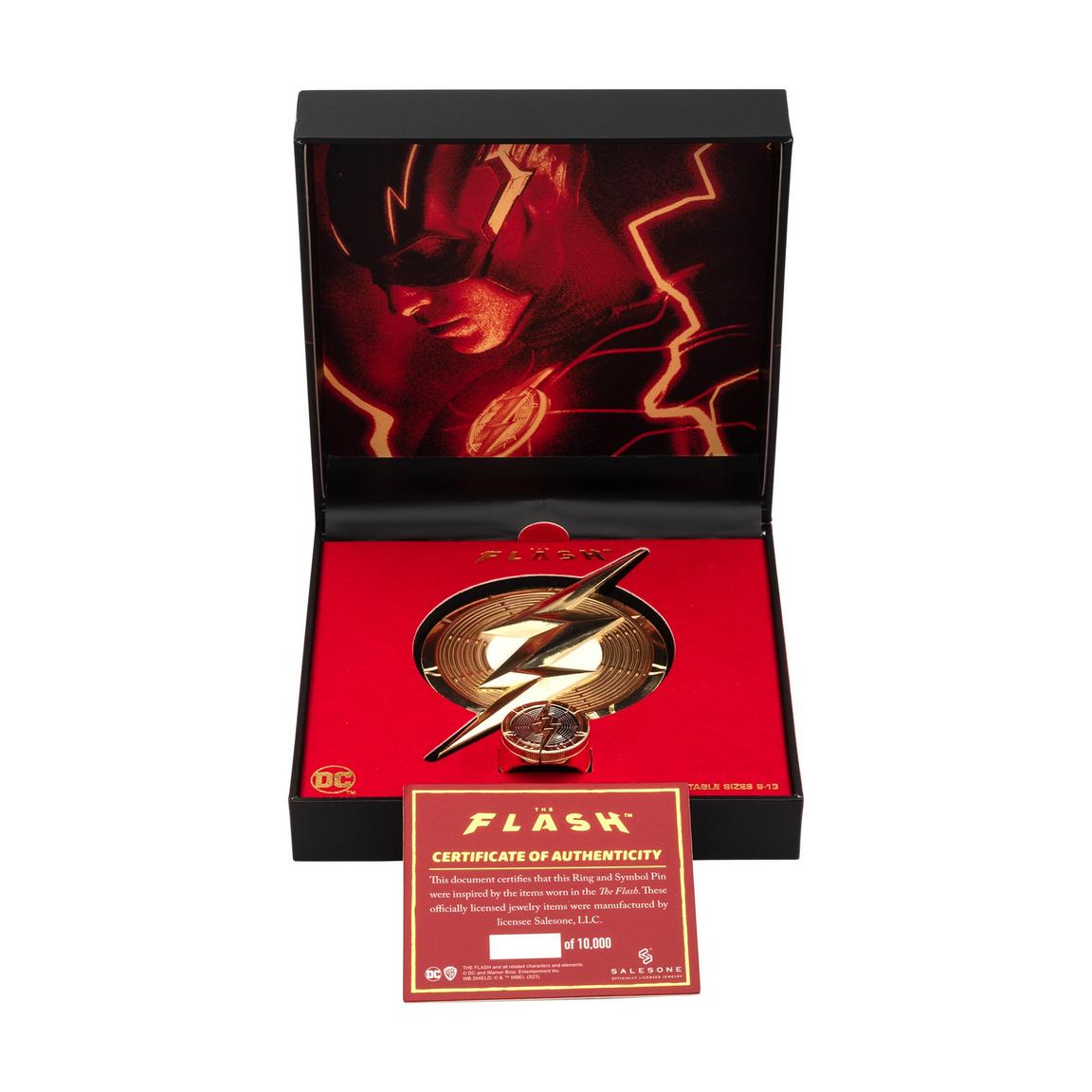 The Flash collector's box set featuring a large enamel pin, a ring, and a certificate of authenticity