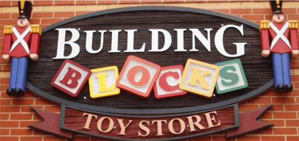 Building blocks store logo on brick wall