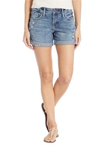 Boyfriend shorts with a destroyed dark indigo wash styled with sandals