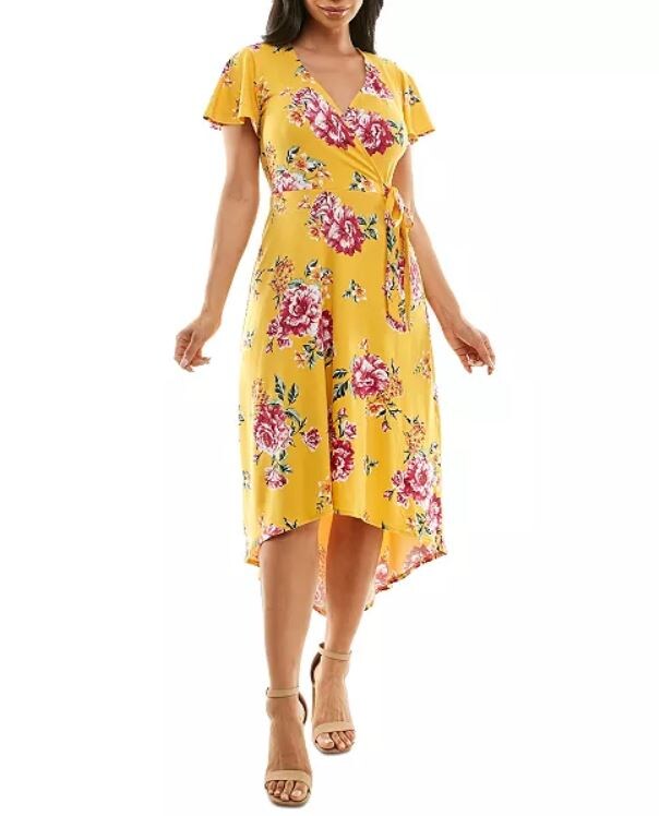 image of woman wearing yellow floral flare dress