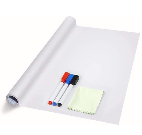 A whiteboard wall decal with markers and wipe cloth on top of it