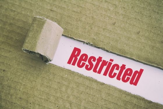 A parcel with the word “restricted” on it. 