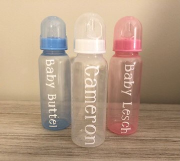 blue, white, and pink custom made baby bottles
